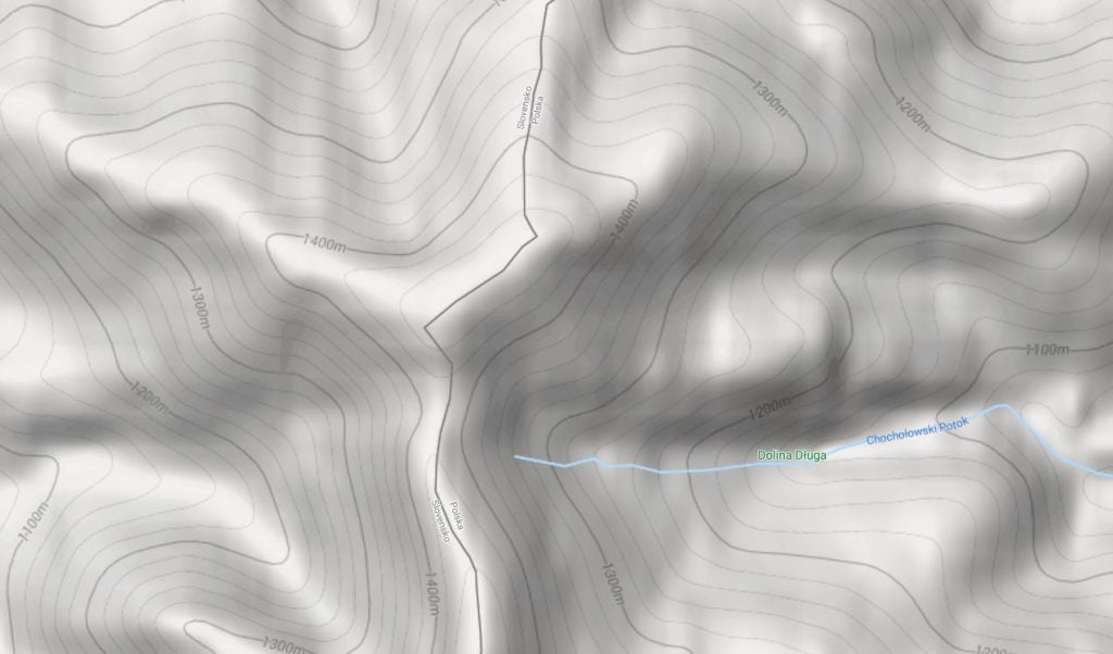 Fragment mapy topograficznej z naniesionymi poziomicami i oznaczoną wysokością bezwzględną n.p.m.